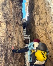 Narrow ladder passage on the via ferrata approach to Torre Finestra.