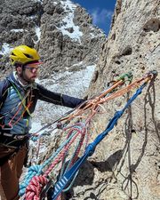 Modern bolted anchor at the first belay station.