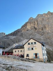 Rifugio Vajolet framed beneath the rock faces