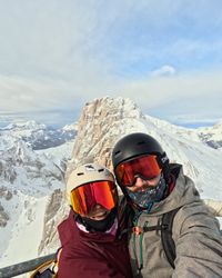 David and Daysi taking a selfie on the Marmolada terrace with Punta Rocca behind them.