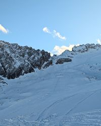 The Bellunese run on Marmolada as seen from Passo Padon, with the massif and ski slopes in view.