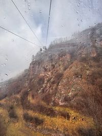 Zooming in on the rainy weather and lack of snow at the base of Alpe Cermis in Cavalese
