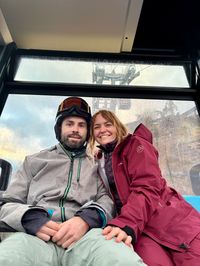 Daysi and David in the gondola goiing back from Alpe Cermis to Cavalese.