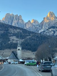 Pozza di Fassa village with the Dolomites backdrop