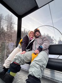 Back on the Cortina Skyline gondola after skiing Cinque Torri