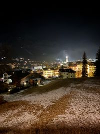 Cortina d'Ampezzo at night with festive lights and softly lit streets