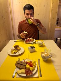 David enjoying breakfast spread at Hotel Serena in Cortina