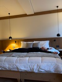 Comfortable bed in Hotel Serena room with modern design