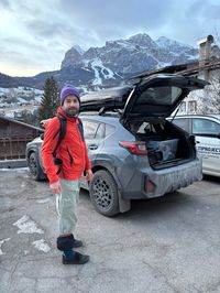 Free parking lot at Hotel Serena in Cortina with mountain backdrop