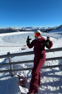 Daysi posing with the Val di Fassa peaks in the back in Latemar, Obereggen.