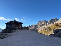 Rifugio Preuss perched with an epic mountain view