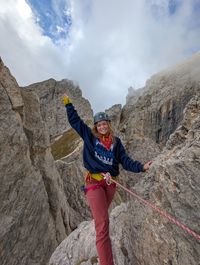 Daysi standing on Torre Edwards after sending Via del Gracchio in the Dolomites.
