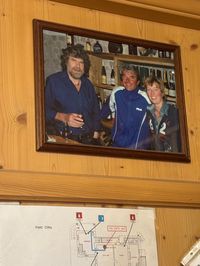 Reinhold Messner portrait displayed inside Rifugio Roda di Vael.