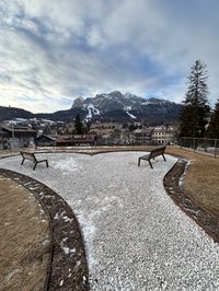 Panoramic view of Tofana ski slopes and Dolomites mountain range from observation point in Cortina d'Ampezzo, Italy