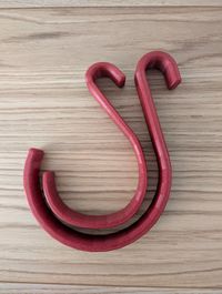 Large and small 3D-printed climbing rope hooks side by side
