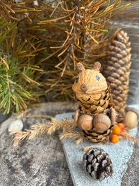 Pine-cone squirrel sculpture in the Sesselschwaige hut
