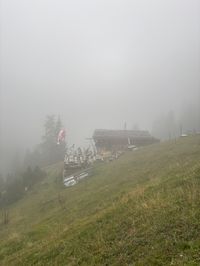 Sesselschwaige hut wrapped in mist mid-loop