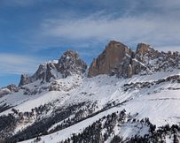 Distant view of the black runs under the Paolina chairlift from the Cima Poppe side of Carezza Ski.