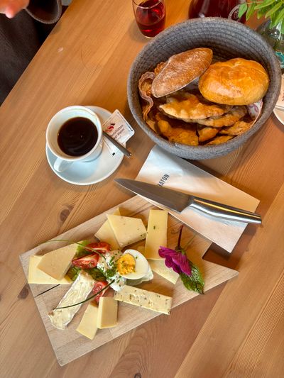 Farm-to-table cheese platter served in Tschafon Hut's dining room