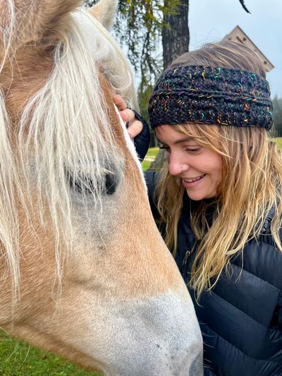 Chestnut horse roaming the pasture above Tschafon Hut