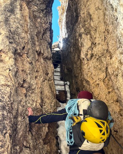 Narrow ladder passage on the via ferrata approach to Torre Finestra.