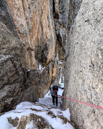 Climber descending the rappel shortcut channel.