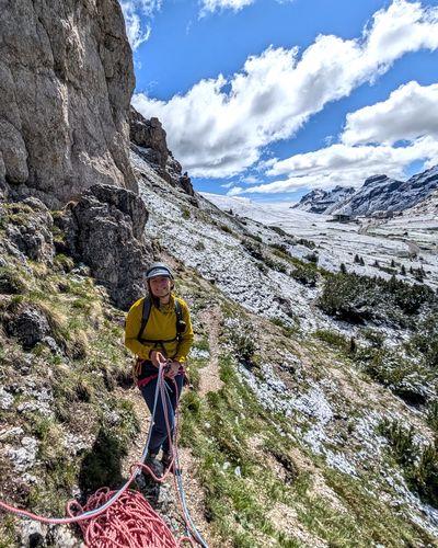 Climber at the base of Via Rodeo on Pilastro Moni.