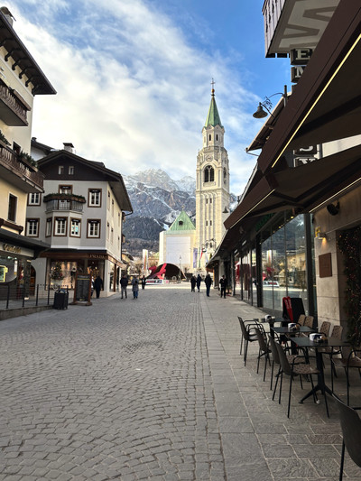 Charming town center of Cortina d'Ampezzo with Tofane peaks in background