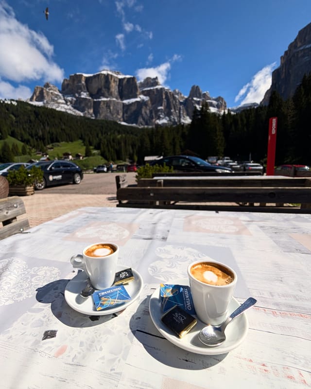 Morning coffee at Rifugio Lupo Bianco before the Via Rodeo approach.