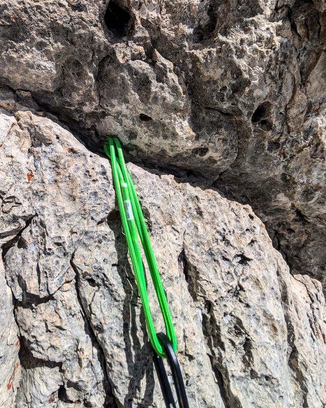 First piton on the steeper section of pitch two.