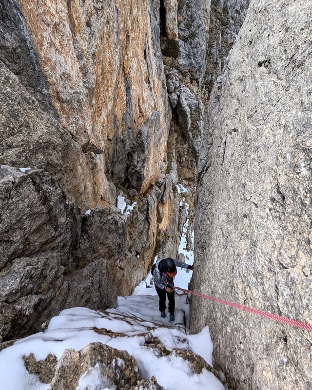 Climber descending the rappel shortcut channel.