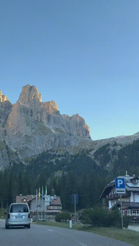 Drive-by view of Piz Ciavazes from the Passo Sella road